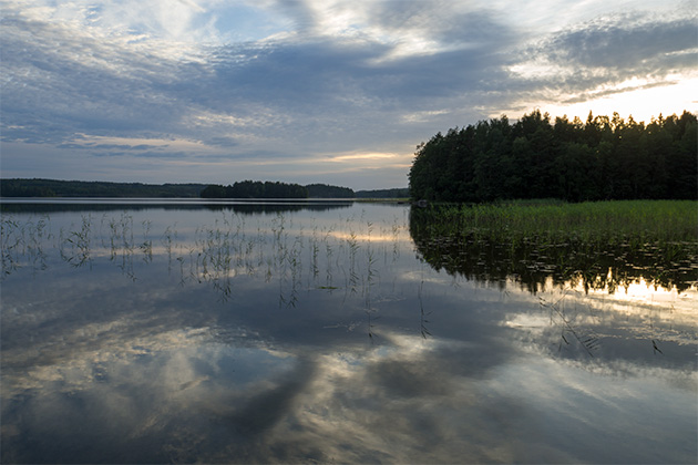 Solnedgång över sjö fel Solnedgång över sjö fel