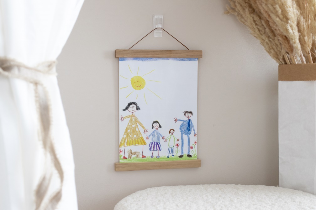 Wandelbare Wanddeko im Kinderzimmer mit der praktischen Posterleiste.