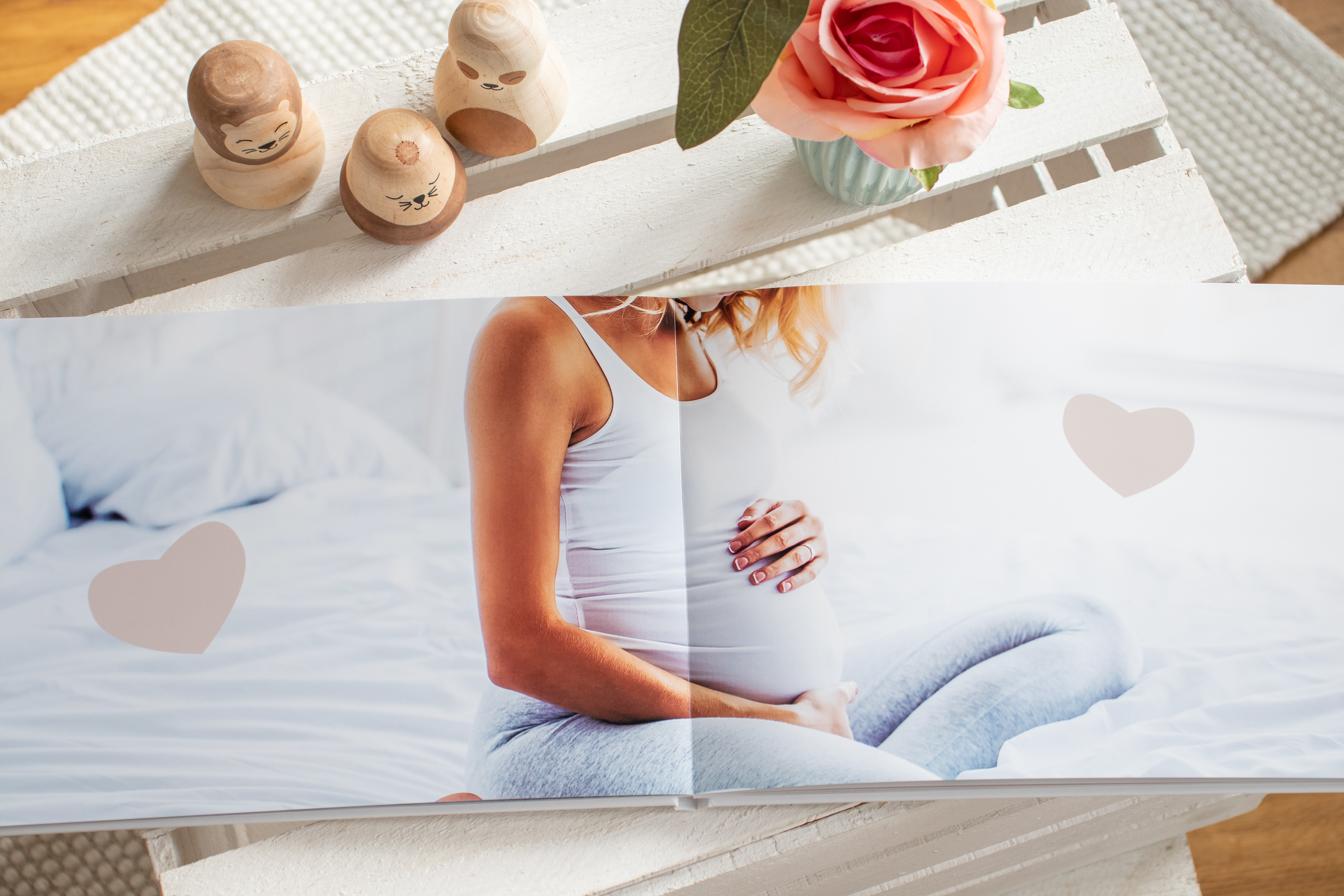 Fotobuch zur Schwangerschaft: Besondere Fotos auf zwei Seiten im Fotobuch festhalten