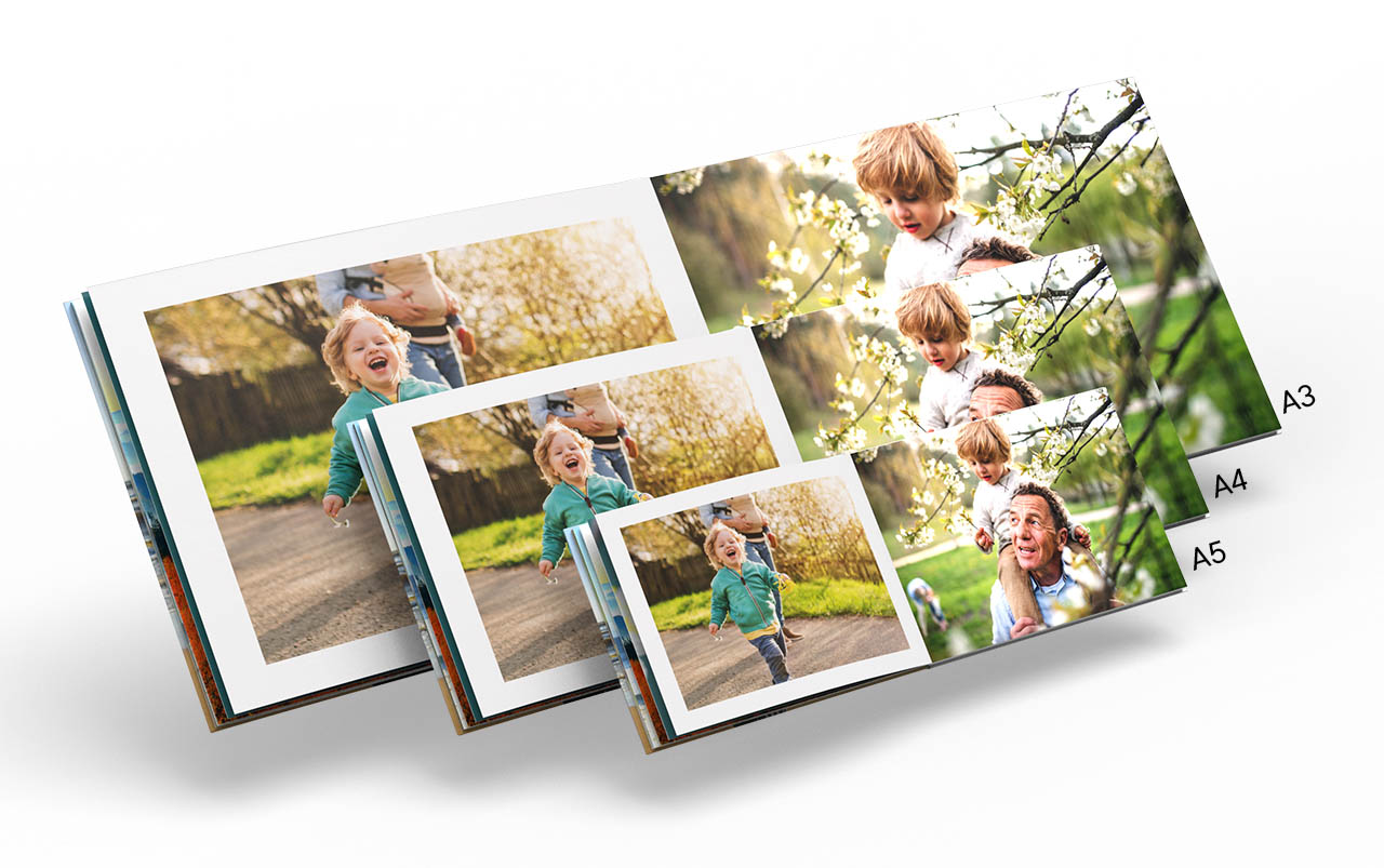 Zum Fotobuch Premium Fotopapier