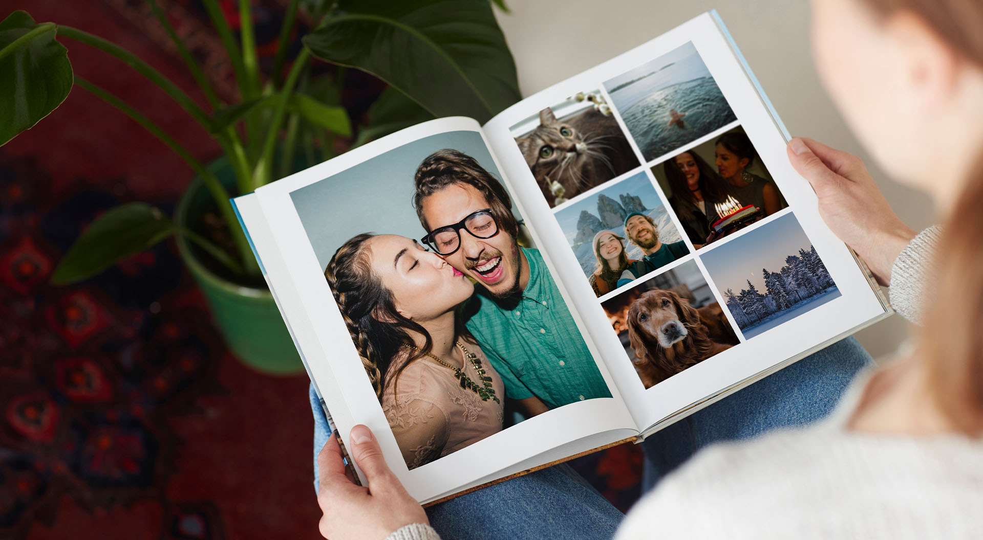 Woman flipping through a photo book of a vacation trip