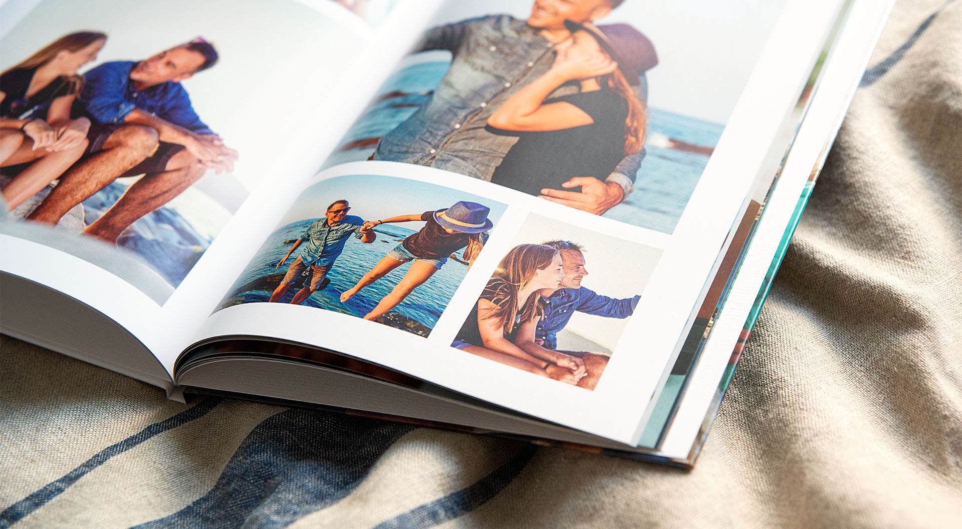 A close-up of a page in a travel photo book with a photo collage
