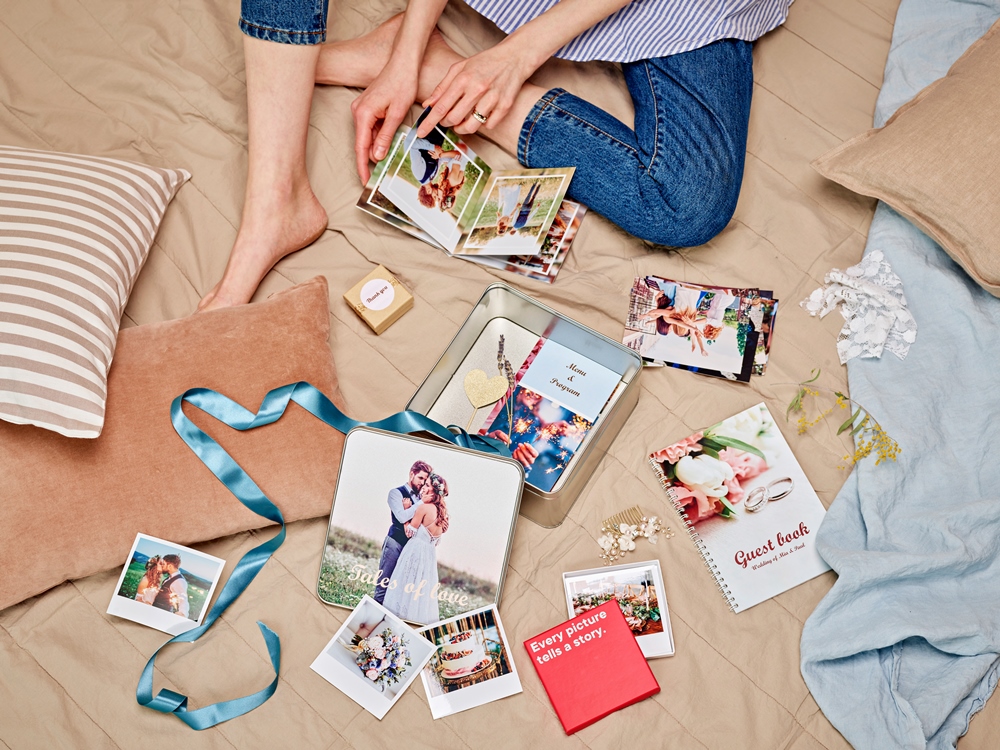 Create a wedding memory box with photos and wedding mementos.