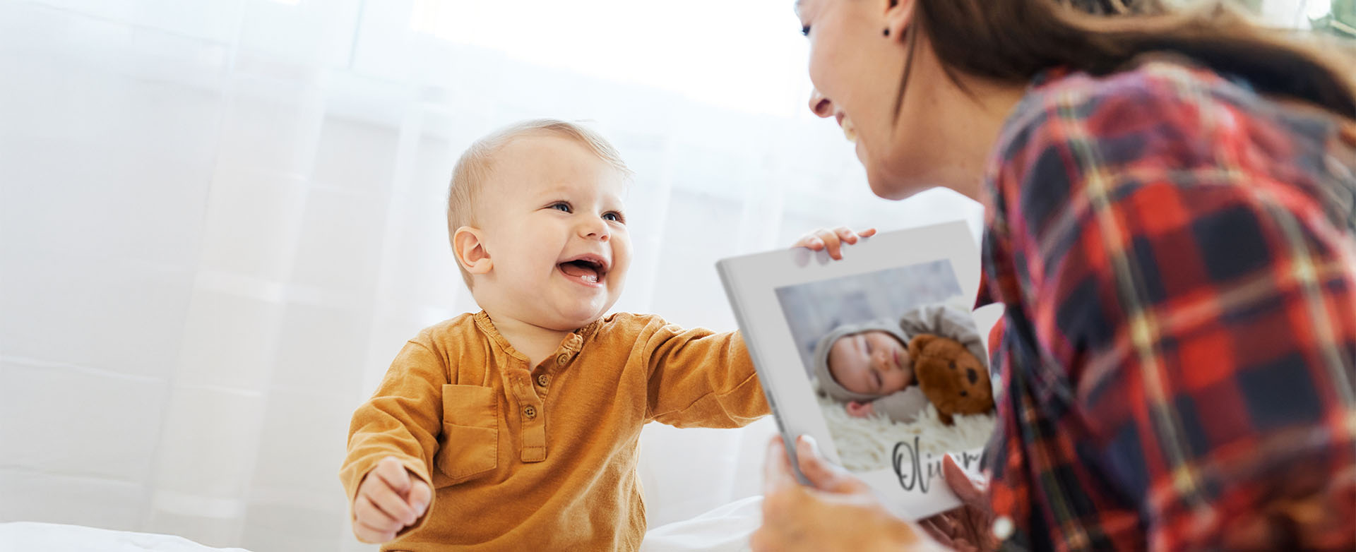 Tallenna vauvan ensimmäinen vuosi kuvakirjaksi